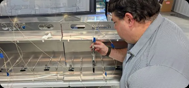 Birchtech engineer at a water testing rig