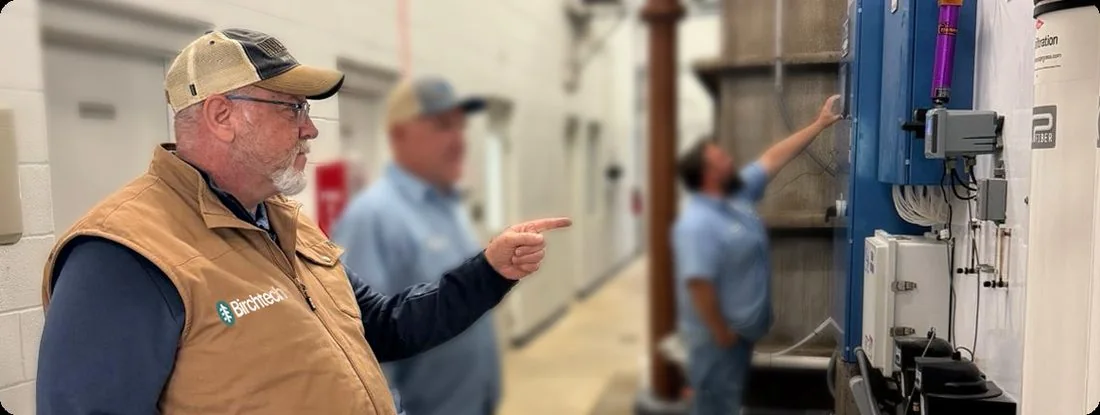 Birchtech representative reviewing equipment with facility staff